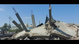 Aftermath of Israeli air strike on industrial facility in central Gaza