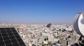 Wide angle shows moment Gaza bank collapses after airstrikes