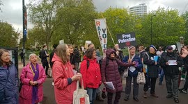Palestine supporters sing in support of Gaza, in London's Hyde Park