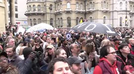Large group of protesters gathered outside the BBC building shouting
