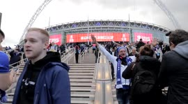 Leicester City fans celebrating their teams FA Cup Final victory against Chelsea at Wembley Stadium 2