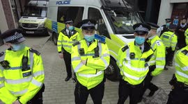 Police block protesters from getting to the Israeli embassy during the Free Palestine March in London