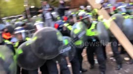 Pro Palestinian protesters clash with the police outside Israeli Embassy, London, UK