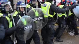 Violent clashes after Police rush in to end a Palestine protest outside the Israeli Embassy, Kensington, London.