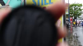 Girl Follows March & Rips Down Anti Lockdown Stickers