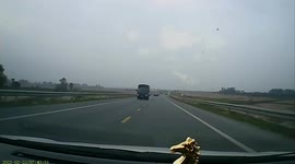 Metal sheet flies off truck into car travelling behind in Vietnam