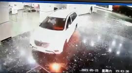 Indian man smashes car INTO Covid-19 hospital after father's death