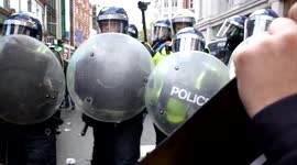 Pro Palestinian protesters clash with the police outside Israeli Embassy, London, UK