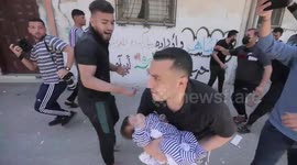 Dash to save lives of baby and injured man after Israeli attack on Gaza