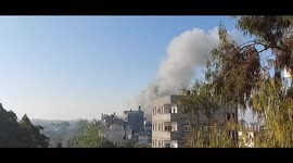 Smoke rises after Israeli air strikes on the Maghazi camp in central Gaza