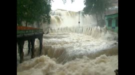 Waterfall gushes past safety barricades as Cyclone Tauktae hits south India