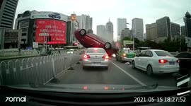Out-of-control car flips up and rolls over vehicles in opposite lane in China