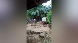 Mudslide swamps homes after heavy rain in the Philippines