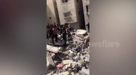 Rocket strike aftermath in Gaza on deadliest day since violence erupted