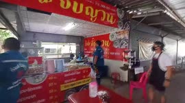 Tree snake caught eating tokay gecko in noodle shop