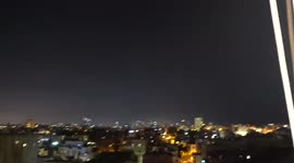 Israel: Iron Dome Interceptors Seen In The Night Sky In Tel Aviv As Sirens Blare