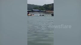 At least seven die in Indonesia when 'overloaded' tourist boat capsizes on reservoir