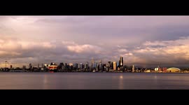 Watch this stunning time-lapse video of a rainbow at sunset as storm passes over downtown Seattle
