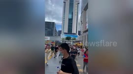 Crowds flee as high-rise building shakes in southern China