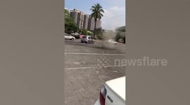 Scary dust devil forms in car park in Taiwan