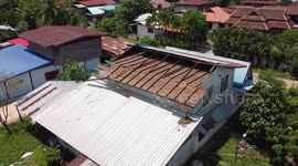 Summer storm damages dozens of buildings in northern Thailand