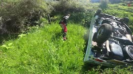 Dramatic moment Japanese bikers rescue of elderly driver who rolled vehicle down hill
