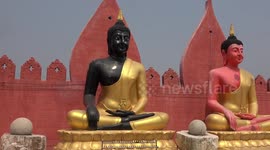 Temple in Thailand paints Buddha statues in rainbow colour