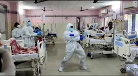 Indian medics beat pandemic stress by dancing in PPE kit with patients inside a COVID hospital in Eastern India