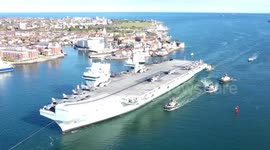 Royal Navy’s flagship HMS Queen Elizabeth sails into Portsmouth ahead of its first operational deployment