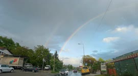The combination of sun and rain creates a rainbow but this time in a different way, a double rainbow.