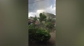 Tornado smashes into village homes in the Philippines