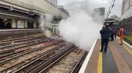 60103 Flying Scotsman departs London Victoria in a cloud of steam hauling the Surrey Hills rail excursion for Steam Dreams