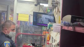 Baltimore Police Review footage after Police arrest from within the store.