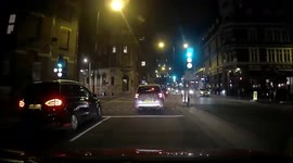 2 Minicabs in London at a pinch point and neither wants to give way so they crash into each other then they both drive off