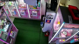 Woman seen on CCTV pooing next to claw grabber machine twice in two months