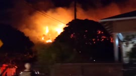 Loma fire seen burning on hillside close to buildings in Santa Barbara, California