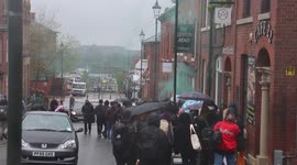 Flare set off as the Oldham Free Palestine protesters march towards Oldham 6th Form College