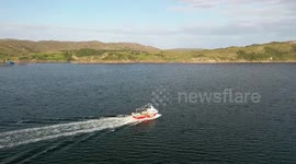 Creel Fishing boat heading out for it’s mornings catch. Departing Shieldaig through Loch Torridon