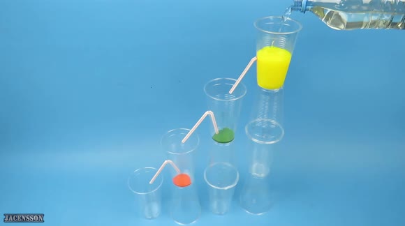 Polish YouTuber creates colourful fountain from cups and straws