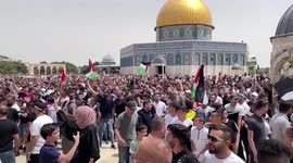 Palestinian Muslim worshippers shout slogans in Jerusalem's al-Aqsa mosque compound, the third holiest site of Islam