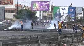 Palestinian protesters clash with Israeli forces in the occupied West Bank