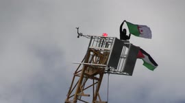 Protester climbs crane at Marble Arch during Free Palestine rally in London