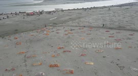 Aerial footage of Ganges River shows hundreds of COVID-19 victims buried in sand
