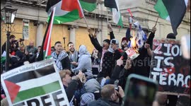 Israel flag burned by pro-Palestine protesters outside Israeli Embassy, London.