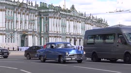 Old-fashioned vintage cars went out of street on St Petersburg for the Second International Transport Festival in St Petersburg, Russia.