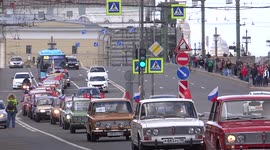 Line of Lada cars went out of street on St Petersburg for the Second International Transport Festival in St Petersburg, Russia.