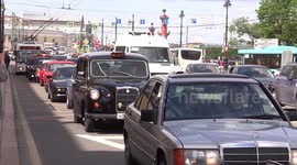 Line of international cars went out of street on St Petersburg for the Second International Transport Festival in St Petersburg, Russia.