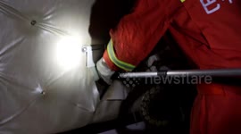 Firefighters catch snake hiding inside resident's headboard in China