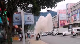 Water sprays into air after minibus knocks over fire hydrant in southwestern China