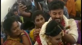 India couple walk down different kind of aisle as they hold wedding on airplane